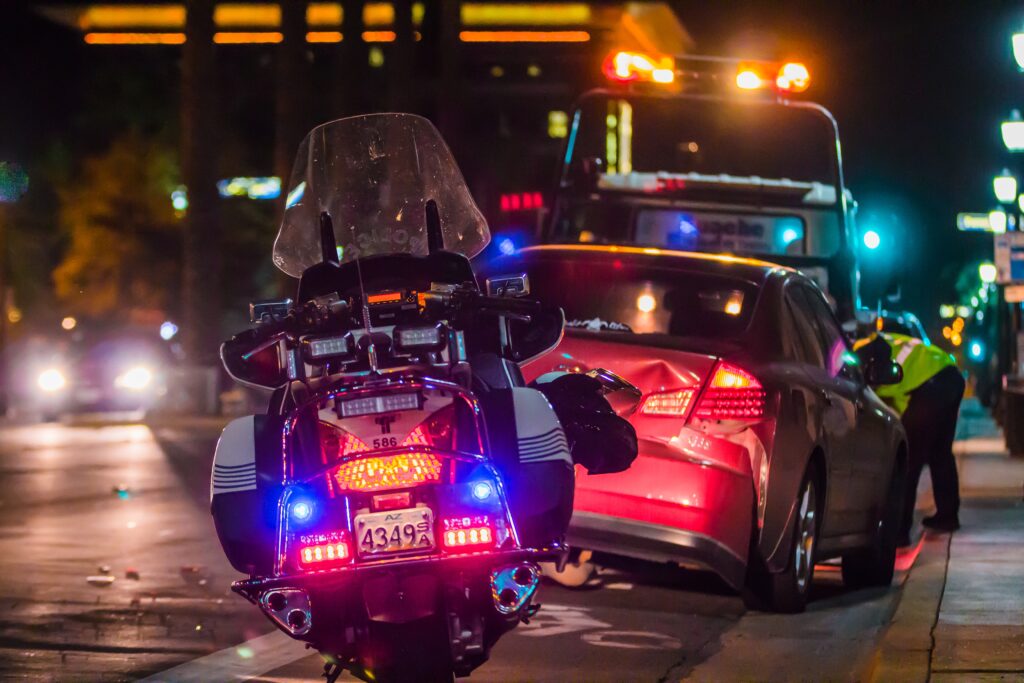 Police Motorcycle at traffic accident scene - Photo on Huss Law PLLC website